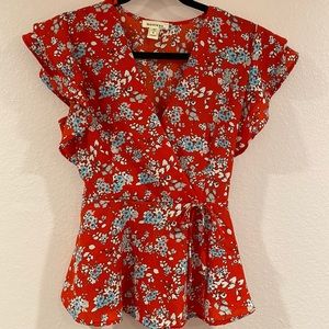 Monteau size small wrap front flounce blouse. NWOT